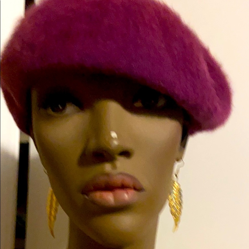 Gold feather earrings